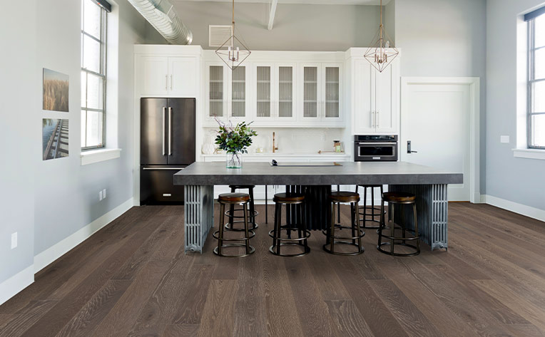 dark toned hardwood flooring in kitchen
